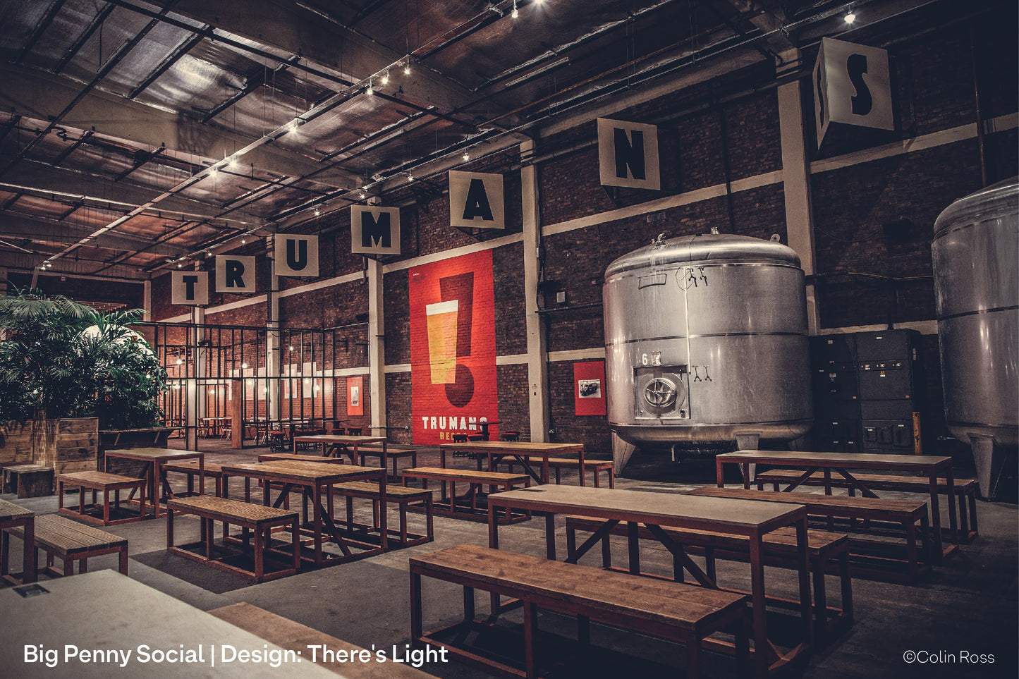 Large warehouse social club lit with budget high output spotlights