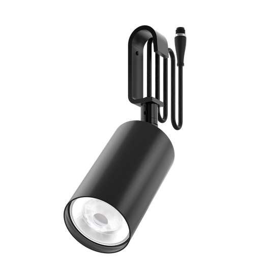 A sustainable, black, architectural spotlight that's designed for circular economy, on a low-voltage Track-Pipe® adaptor